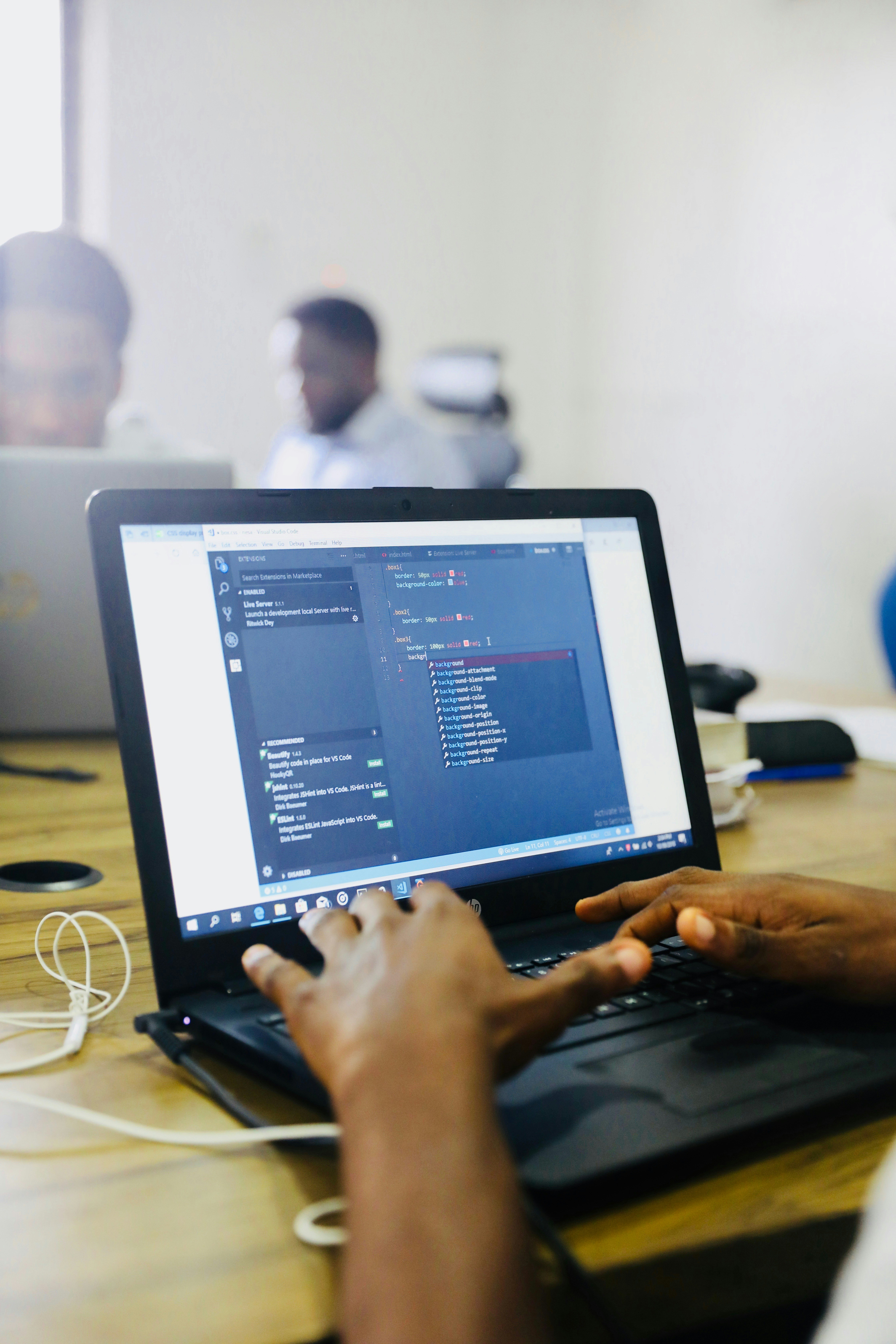 Engineer shipping early enterprise code in a focused office setting